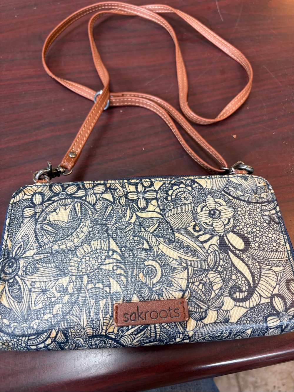 Sakroots Cream and Navy Floral Doodle Crossbody with Tan Strap